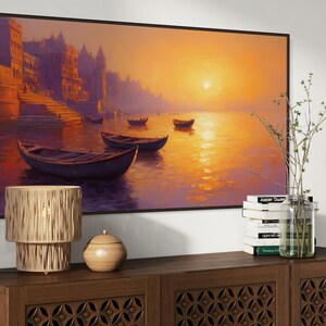 This breathtaking canvas print captures the beauty of the Ganges River at sunrise. The golden light reflects off the calm water, creating a peaceful and spiritual scene. This artwork brings a sense of tranquility and cultural richness to any space.