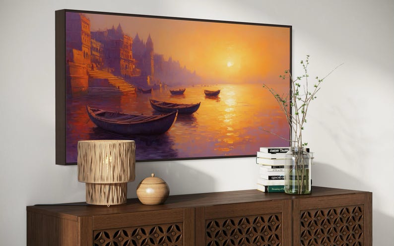 This breathtaking canvas print captures the beauty of the Ganges River at sunrise. The golden light reflects off the calm water, creating a peaceful and spiritual scene. This artwork brings a sense of tranquility and cultural richness to any space.