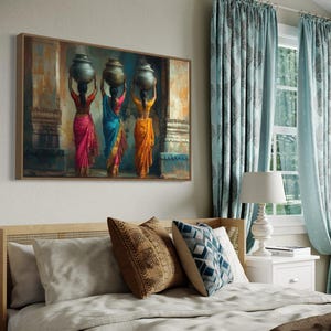 Celebrate cultural beauty with this vibrant art piece depicting three Indian women in colorful saris, gracefully carrying pots on their heads. The rich textures and warm tones make it a stunning addition to any space.