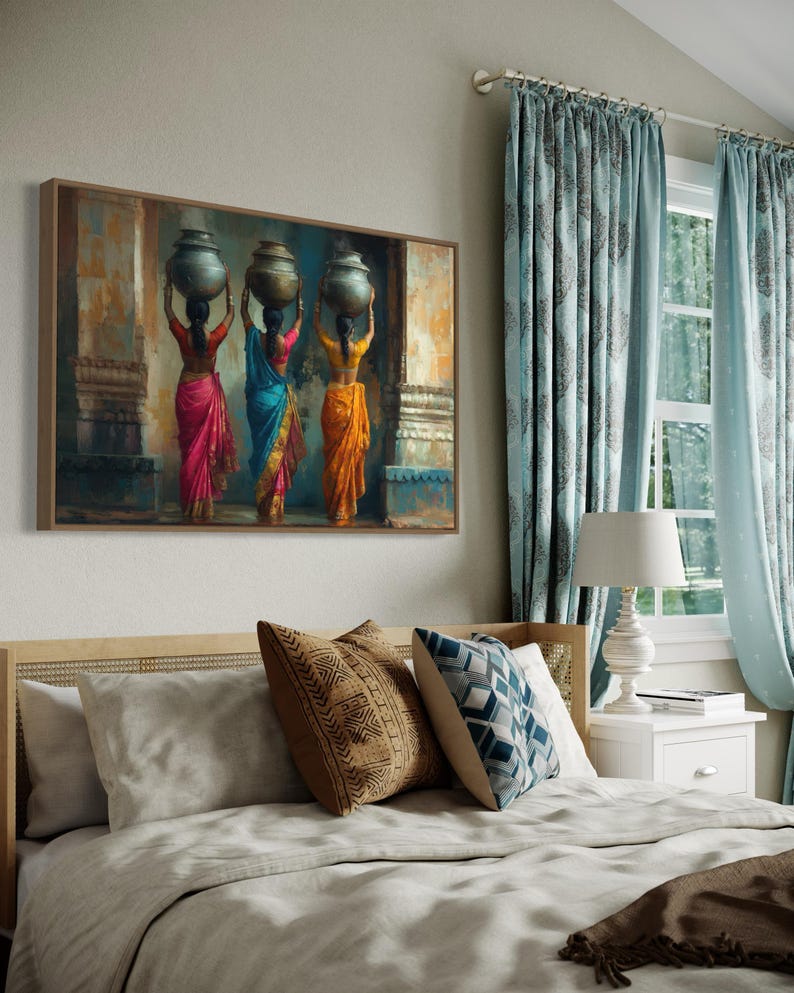 Celebrate cultural beauty with this vibrant art piece depicting three Indian women in colorful saris, gracefully carrying pots on their heads. The rich textures and warm tones make it a stunning addition to any space.