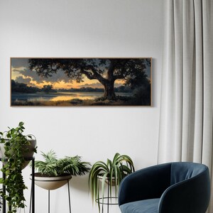 Capturing the tranquil essence of dusk, this panoramic artwork features a majestic oak tree overlooking a serene river, illuminated by the golden hues of a setting sun.