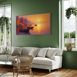 This breathtaking canvas print captures the beauty of the Ganges River at sunrise. The golden light reflects off the calm water, creating a peaceful and spiritual scene. This artwork brings a sense of tranquility and cultural richness to any space.