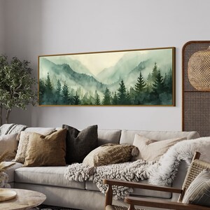Misty Mountain Serenity: A dreamy vista where lush evergreens pierce through the soft veil of morning mist, creating layers of tranquil beauty.