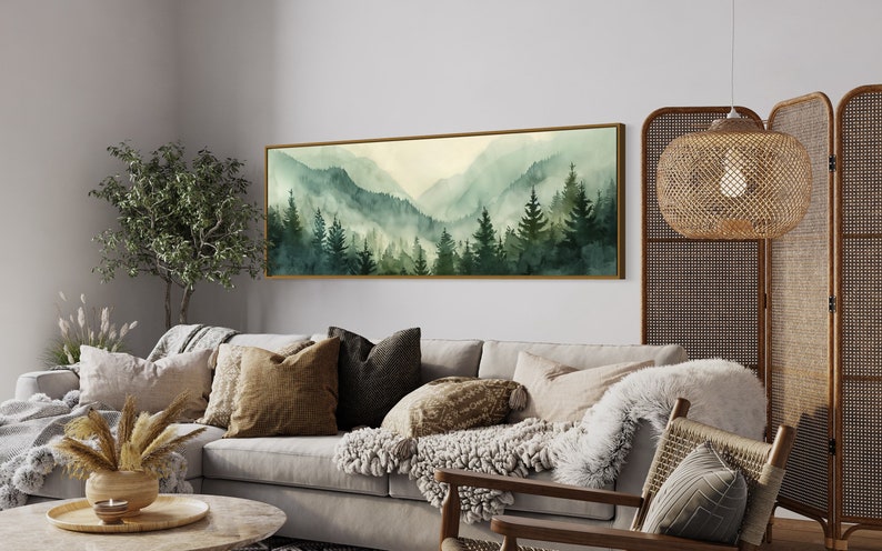 Misty Mountain Serenity: A dreamy vista where lush evergreens pierce through the soft veil of morning mist, creating layers of tranquil beauty.