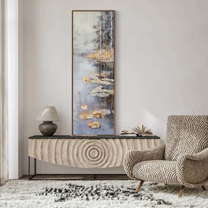 This serene painting features a tranquil pond with lily pads and birch trees. The soft, muted colors and delicate details create a peaceful, reflective scene, perfect for adding a touch of nature and calm to any space.