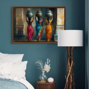 Celebrate cultural beauty with this vibrant art piece depicting three Indian women in colorful saris, gracefully carrying pots on their heads. The rich textures and warm tones make it a stunning addition to any space.