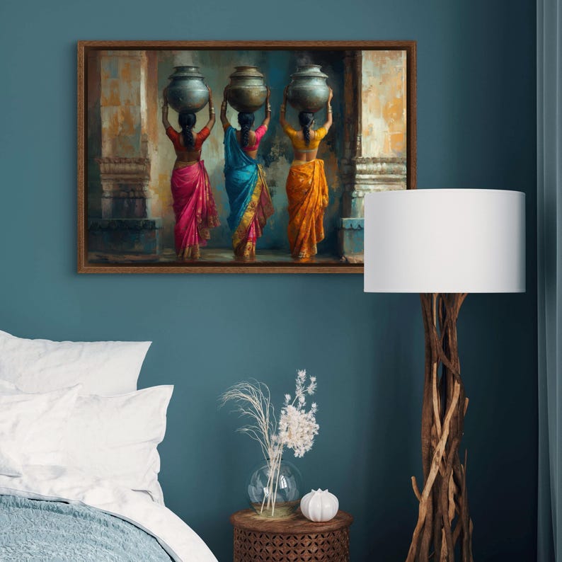 Celebrate cultural beauty with this vibrant art piece depicting three Indian women in colorful saris, gracefully carrying pots on their heads. The rich textures and warm tones make it a stunning addition to any space.