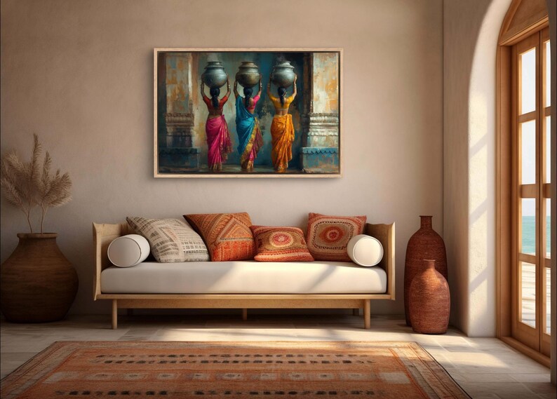 Celebrate cultural beauty with this vibrant art piece depicting three Indian women in colorful saris, gracefully carrying pots on their heads. The rich textures and warm tones make it a stunning addition to any space.