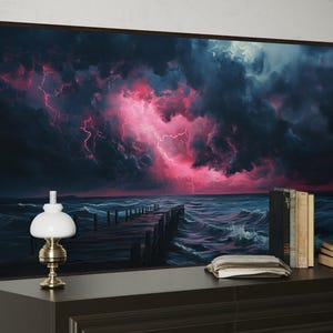 This dramatic storm canvas captures a dark ocean scene with a striking pink lightning sky over a wooden pier. The moody waves and vibrant storm clouds create a bold statement piece. Perfect for lovers of dramatic nature art, coastal décor.
