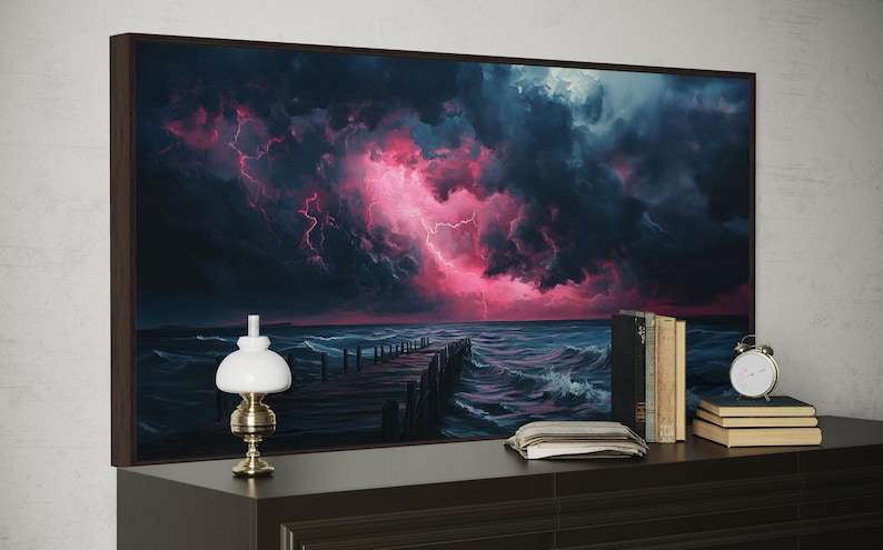 This dramatic storm canvas captures a dark ocean scene with a striking pink lightning sky over a wooden pier. The moody waves and vibrant storm clouds create a bold statement piece. Perfect for lovers of dramatic nature art, coastal décor.