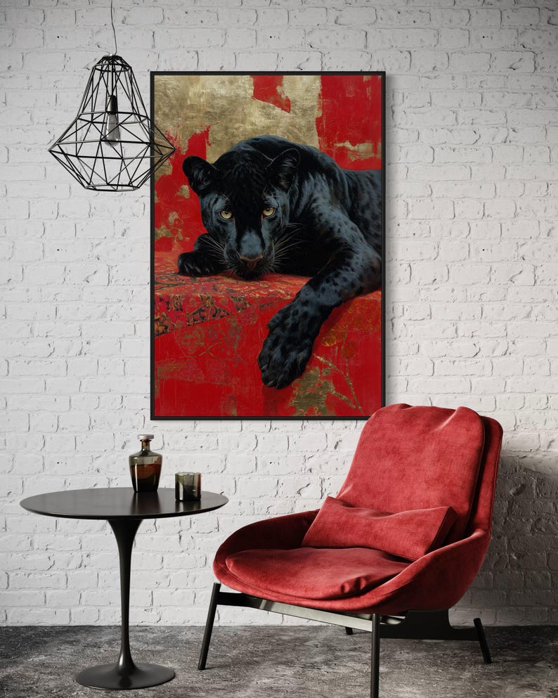 Striking art print of a black panther resting against a rich red and gold abstract background. The panther’s piercing gaze, sleek dark fur, and powerful presence create a dramatic and luxurious statement piece, blending wildlife majesty with bold modern art design for a captivating interior accent.