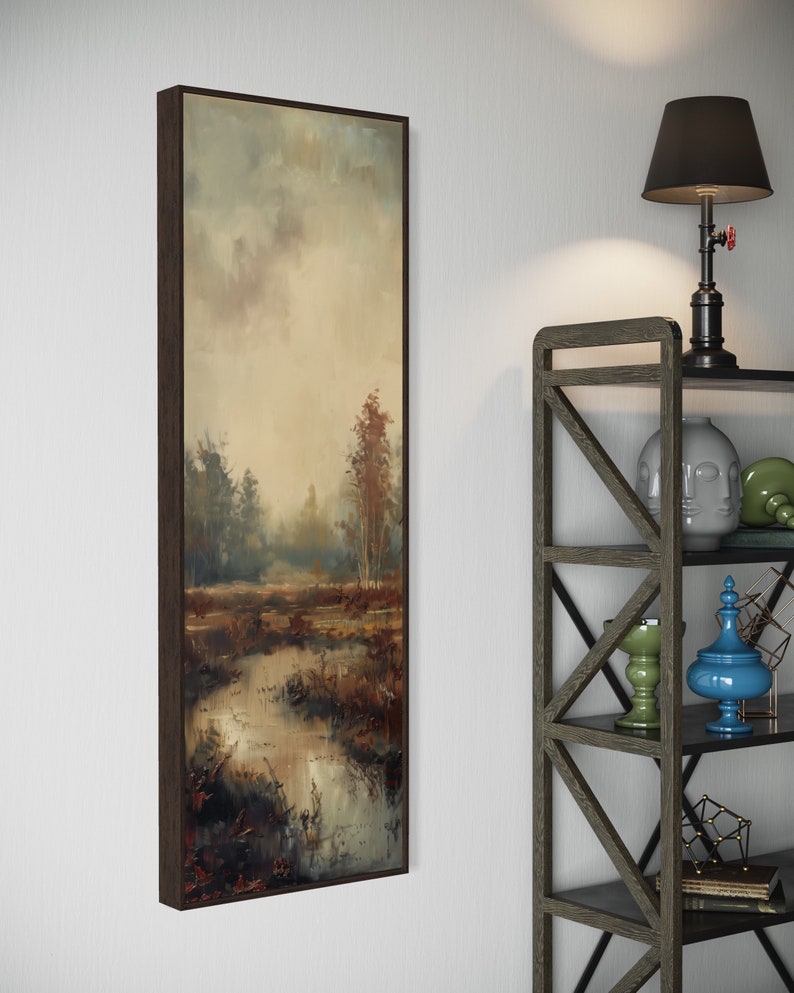 This atmospheric painting captures a moody landscape with a dramatic interplay of light and shadow. A muted palette conveys the serenity of a misty marshland, evoking a sense of quiet introspection.