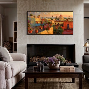 This colorful painting shows a Mexican city at sunset with terracotta rooftops, blooming bougainvillea, and church domes. The warm hues and intricate details evoke the charm and beauty of a picturesque Mexican town, perfect for cultural decor.