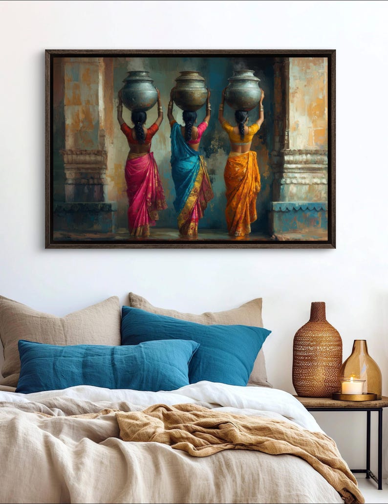 Celebrate cultural beauty with this vibrant art piece depicting three Indian women in colorful saris, gracefully carrying pots on their heads. The rich textures and warm tones make it a stunning addition to any space.