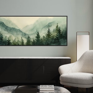 Misty Mountain Serenity: A dreamy vista where lush evergreens pierce through the soft veil of morning mist, creating layers of tranquil beauty.