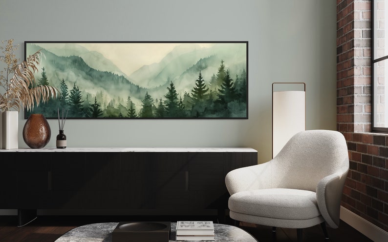 Misty Mountain Serenity: A dreamy vista where lush evergreens pierce through the soft veil of morning mist, creating layers of tranquil beauty.