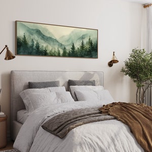 Misty Mountain Serenity: A dreamy vista where lush evergreens pierce through the soft veil of morning mist, creating layers of tranquil beauty.