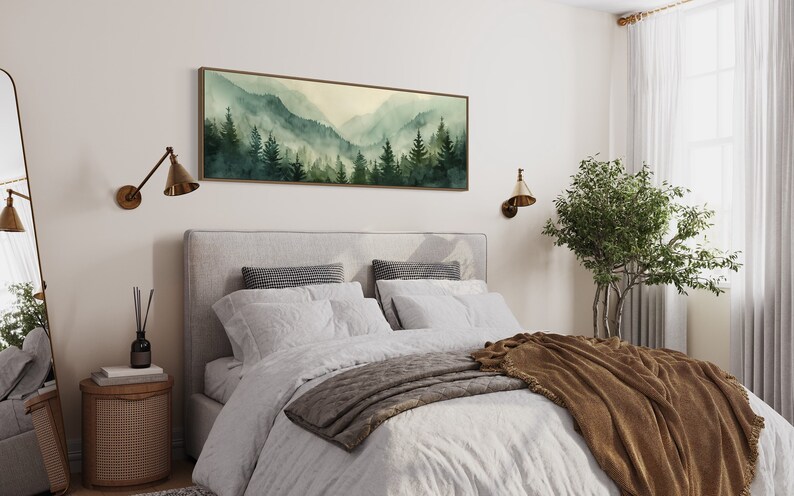 Misty Mountain Serenity: A dreamy vista where lush evergreens pierce through the soft veil of morning mist, creating layers of tranquil beauty.