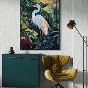 This canvas print captures a majestic heron standing amidst lush tropical foliage, illuminated by a soft, golden sunrise. Its detailed portrayal and vibrant setting make it a striking piece for any nature or bird enthusiast's collection.