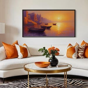 This breathtaking canvas print captures the beauty of the Ganges River at sunrise. The golden light reflects off the calm water, creating a peaceful and spiritual scene. This artwork brings a sense of tranquility and cultural richness to any space.