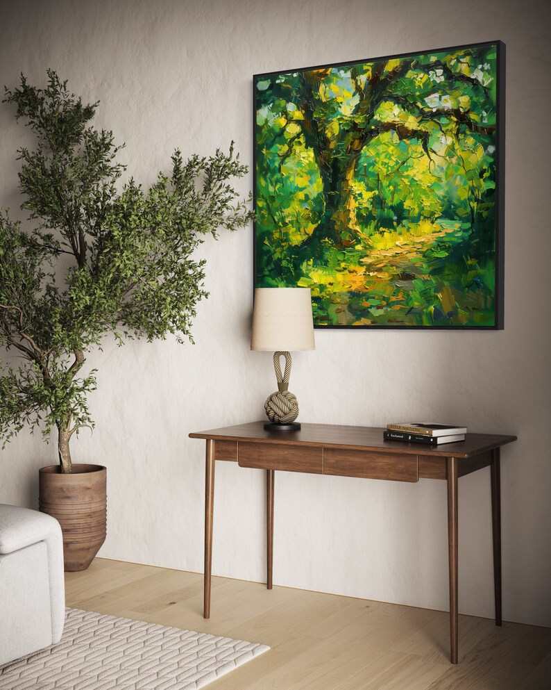 The old oak stands regal and enduring, its twisting branches like wise, outstretched arms, cloaked in a tapestry of sun-kissed leaves, creating a serene sanctuary of nature's timeless beauty.