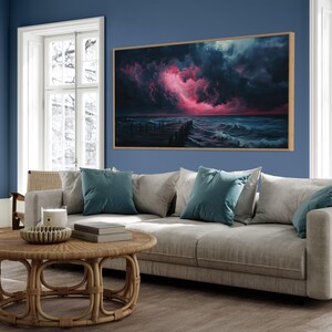 This dramatic storm canvas captures a dark ocean scene with a striking pink lightning sky over a wooden pier. The moody waves and vibrant storm clouds create a bold statement piece. Perfect for lovers of dramatic nature art, coastal décor.