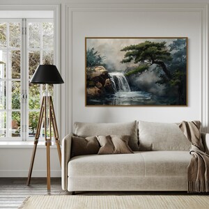 This canvas print beautifully portrays a serene Japanese garden with a cascading waterfall and majestic pine trees, encapsulating the essence of tranquility and the enduring beauty of nature. Perfect for creating a peaceful retreat in your space.