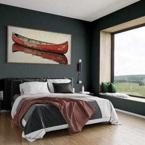 This artwork features a rustic red canoe resting serenely on calm waters. The canoe, with its weathered surface, reflects beautifully in the water, showcasing its rich color. The soft background adds a tranquil atmosphere, perfect for nature lovers.