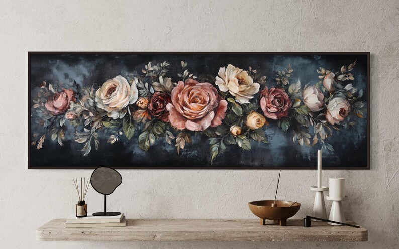 This Victorian-inspired floral canvas art showcases a stunning arrangement of roses in soft pink, cream, and deep red hues. Set against a moody dark blue background, it exudes timeless elegance and romantic charm.