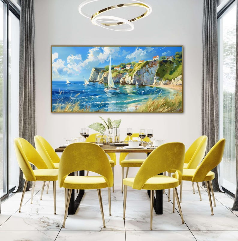 Sailboats glide on azure waters near chalky cliffs with green tops under a vast, cloud-dappled sky, portraying a serene, sunlit seascape.