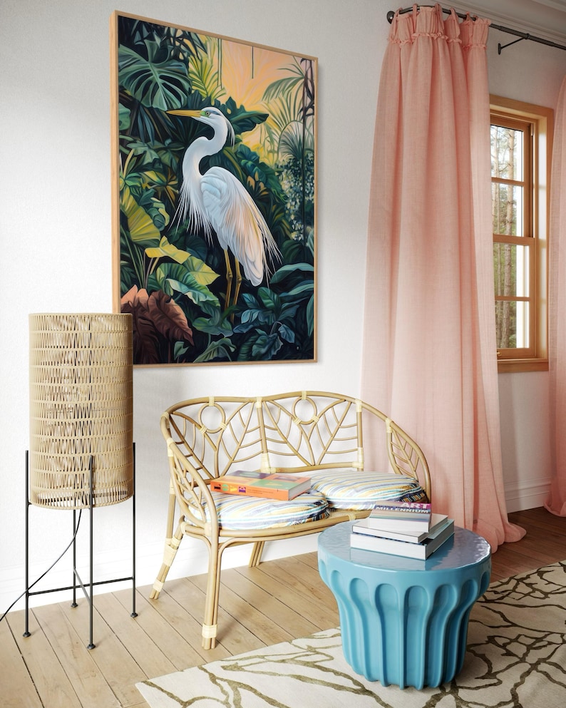 This canvas print captures a majestic heron standing amidst lush tropical foliage, illuminated by a soft, golden sunrise. Its detailed portrayal and vibrant setting make it a striking piece for any nature or bird enthusiast's collection.