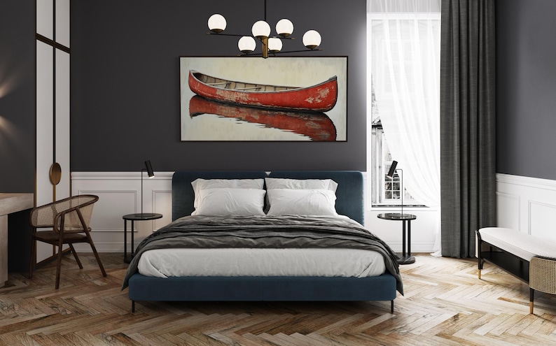 This artwork features a rustic red canoe resting serenely on calm waters. The canoe, with its weathered surface, reflects beautifully in the water, showcasing its rich color. The soft background adds a tranquil atmosphere, perfect for nature lovers.
