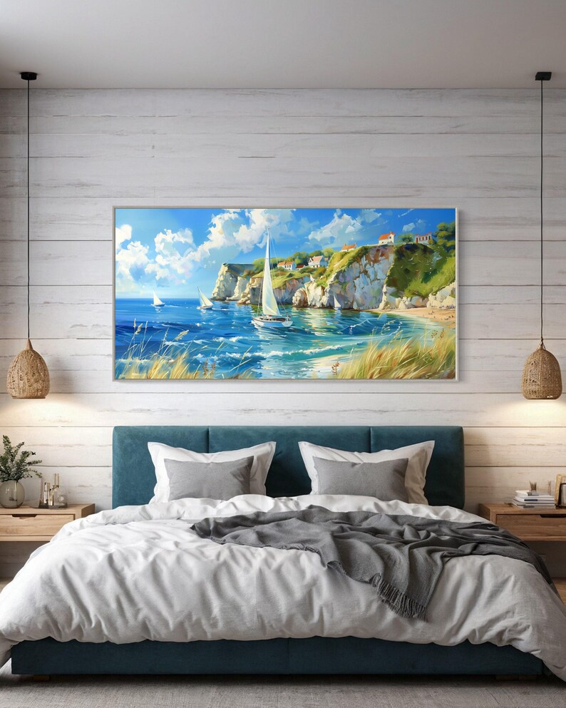 Sailboats glide on azure waters near chalky cliffs with green tops under a vast, cloud-dappled sky, portraying a serene, sunlit seascape.