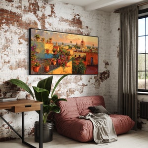 This colorful painting shows a Mexican city at sunset with terracotta rooftops, blooming bougainvillea, and church domes. The warm hues and intricate details evoke the charm and beauty of a picturesque Mexican town, perfect for cultural decor.
