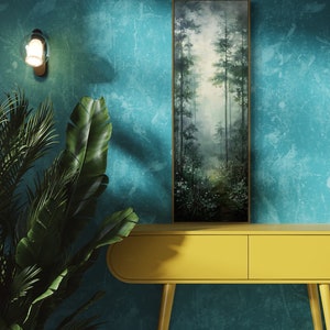 This serene painting depicts a misty forest with tall trees and delicate wildflowers. The soft, muted colors and ethereal atmosphere create a sense of tranquility, perfect for adding a touch of nature and calm to any space.