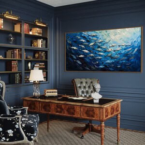 A dynamic school of fish swims in unison through the tranquil blue sea, their silvery scales reflecting light, depicted with thick, textured brushstrokes that give life and movement to this captivating marine scene.