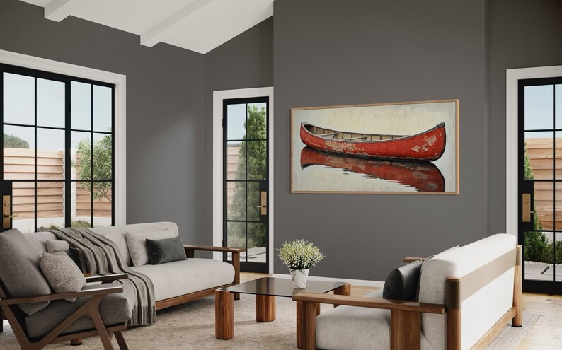 This artwork features a rustic red canoe resting serenely on calm waters. The canoe, with its weathered surface, reflects beautifully in the water, showcasing its rich color. The soft background adds a tranquil atmosphere, perfect for nature lovers.