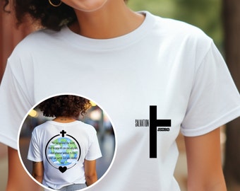 May include: White t-shirt with a black cross and the words "SALVATION" and "JOHN 3:16" printed on the front. The back of the shirt features a graphic of the Earth with a cross and the text "For God so loved the world that he gave his one and only Son, that whoever believes in him shall not perish but have eternal life."