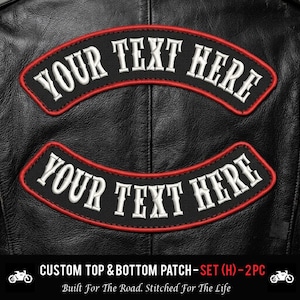 May include: A set of two black embroidered patches with a curved shape, featuring a red border and white text that reads YOUR TEXT HERE. The patches are displayed on a black leather surface, designed for customization with personalized lettering.