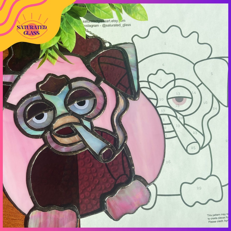 May include: A stained glass art piece of a cartoon dog wearing sunglasses and smoking a cigarette. The dog is pink, red, and blue. The image includes a numbered pattern for creating a stained glass project.