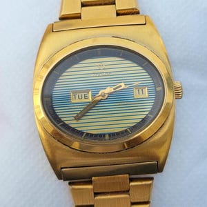 Vintage Zodiac Golden SST 36000 Automatic Men's Watch: Swiss Made