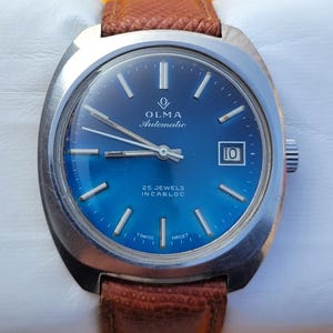 Vintage Olma Blue Dial Automatic Watch: Swiss Made 25 Jewels