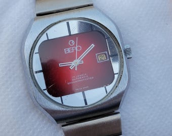 Vintage BERO Automatic Watch: Red Dial Swiss Made Stainless Steel