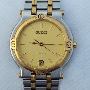 Stunning Vintage Gucci 9000M Two Tone Swiss Made Steel and Gold Unisex Wrist Watch