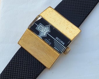 Reloj Sicura vintage con salto de hora: reloj de pulsera para hombre de fabricación suiza con 17 joyas