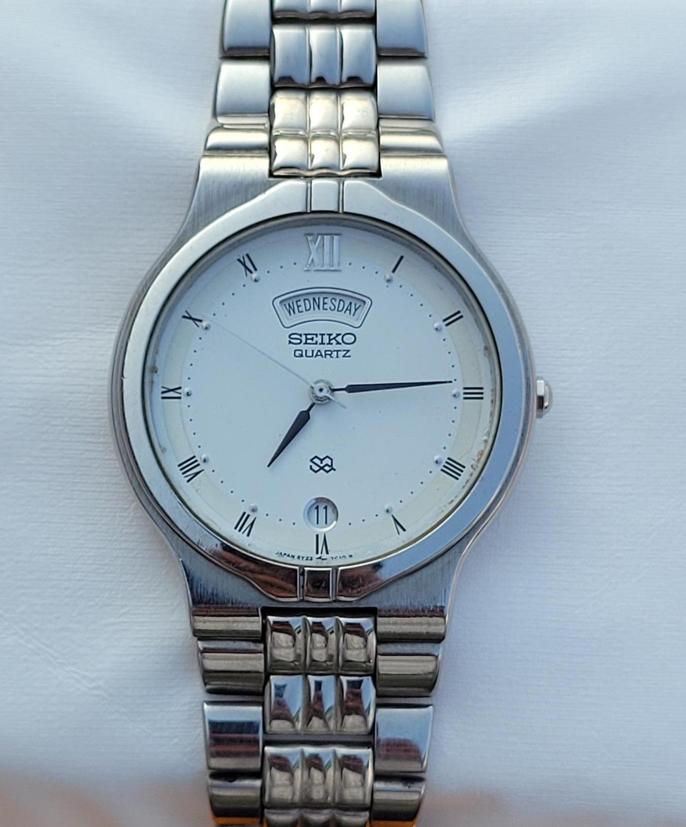 Vintage Seiko SQ Roman Quartz 5Y23-7A80 Stainless Steel