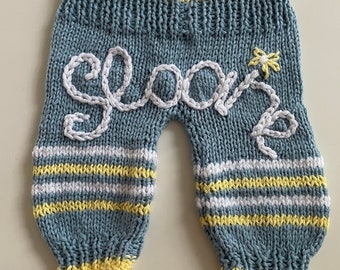 Hand knitted baby pant with name embroidery on the back