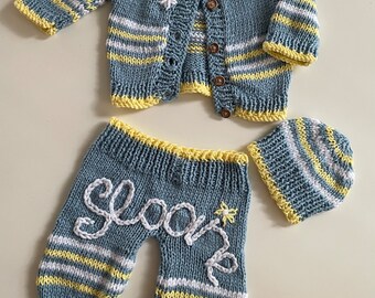 Hand knitted multi color baby outfit