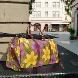 Yellow & Purple Floral Waterproof Travel Bag, Bold Weekender Duffle, Tropical Flower Carry-On Tote, Durable Bag for Spring Getaways