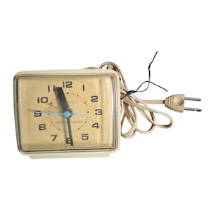 Reloj despertador General Electric vintage con esfera iluminada, modelo 7373-4A, color crema #GE